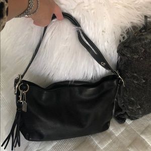 Black leather Coach Hobo purse.